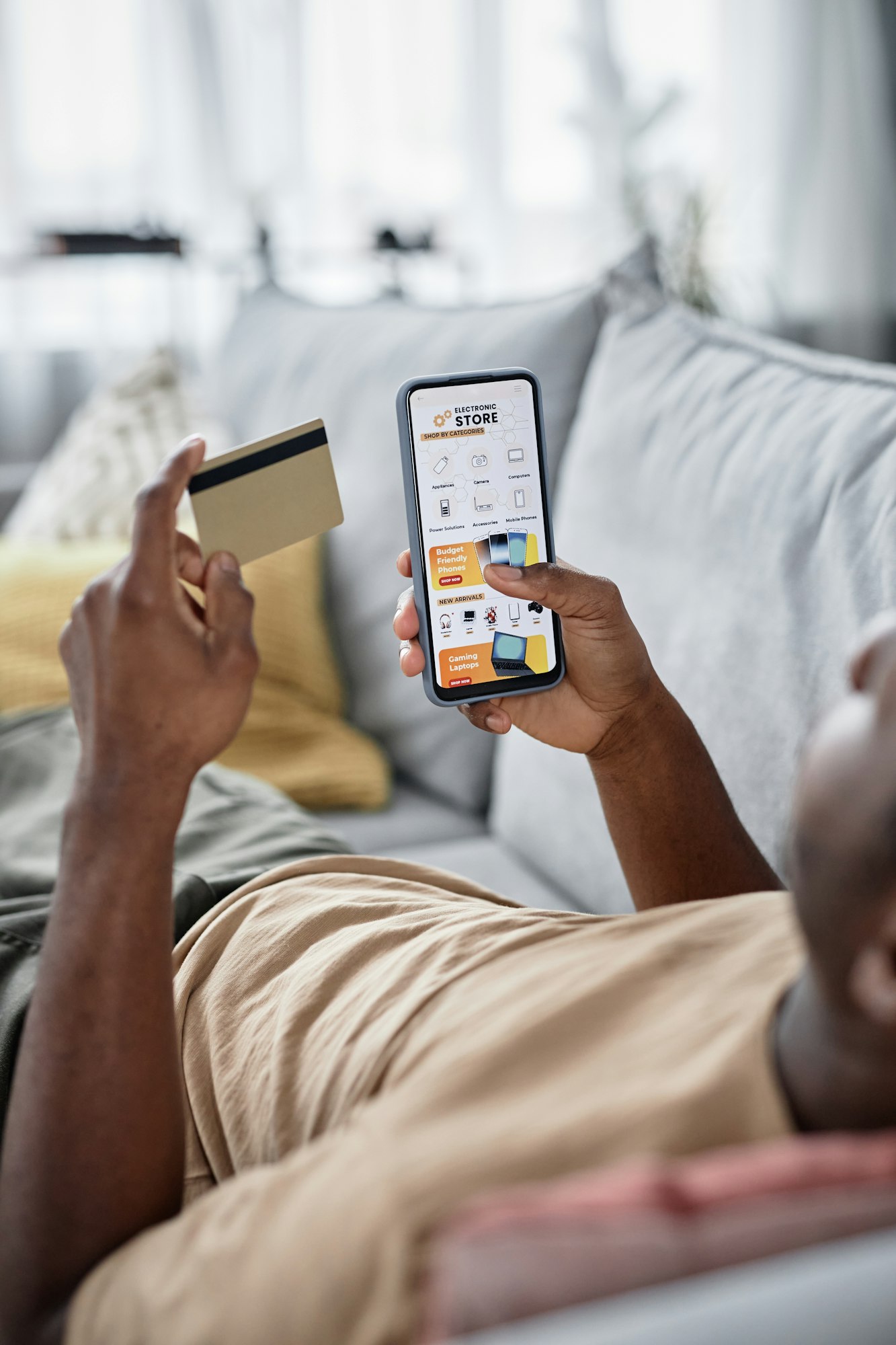 Young Man Using Online Shop App